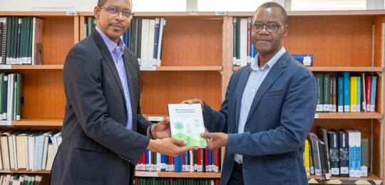 Handing over of book